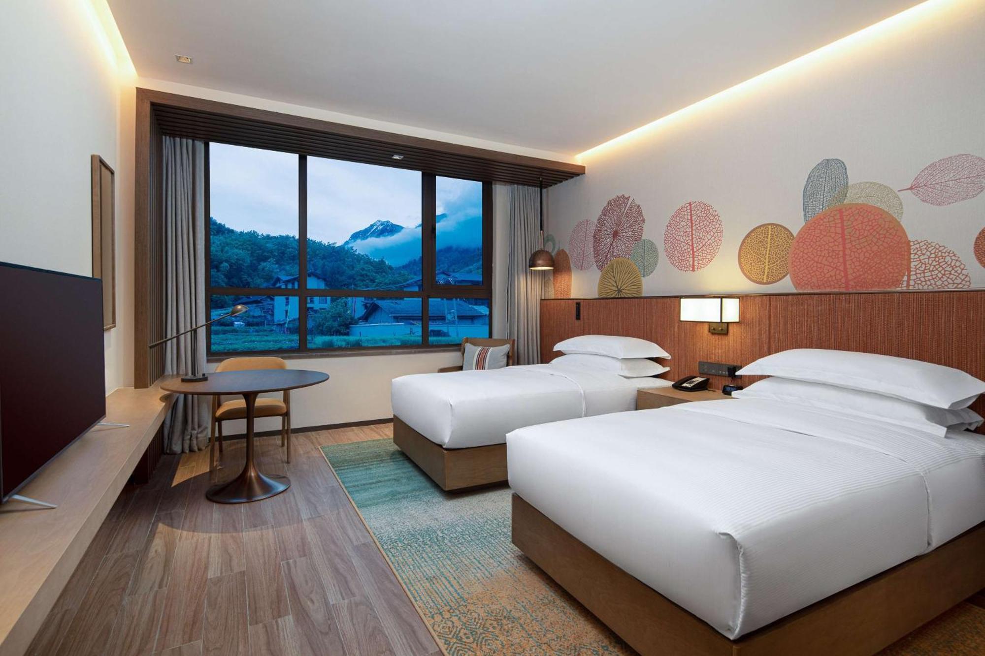 Hilton Garden Inn Цзючжайгоу Экстерьер фото
